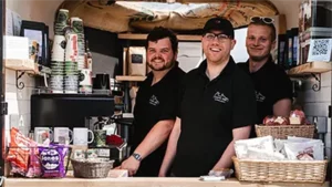 Coffi Dre team members in coffee trailer.